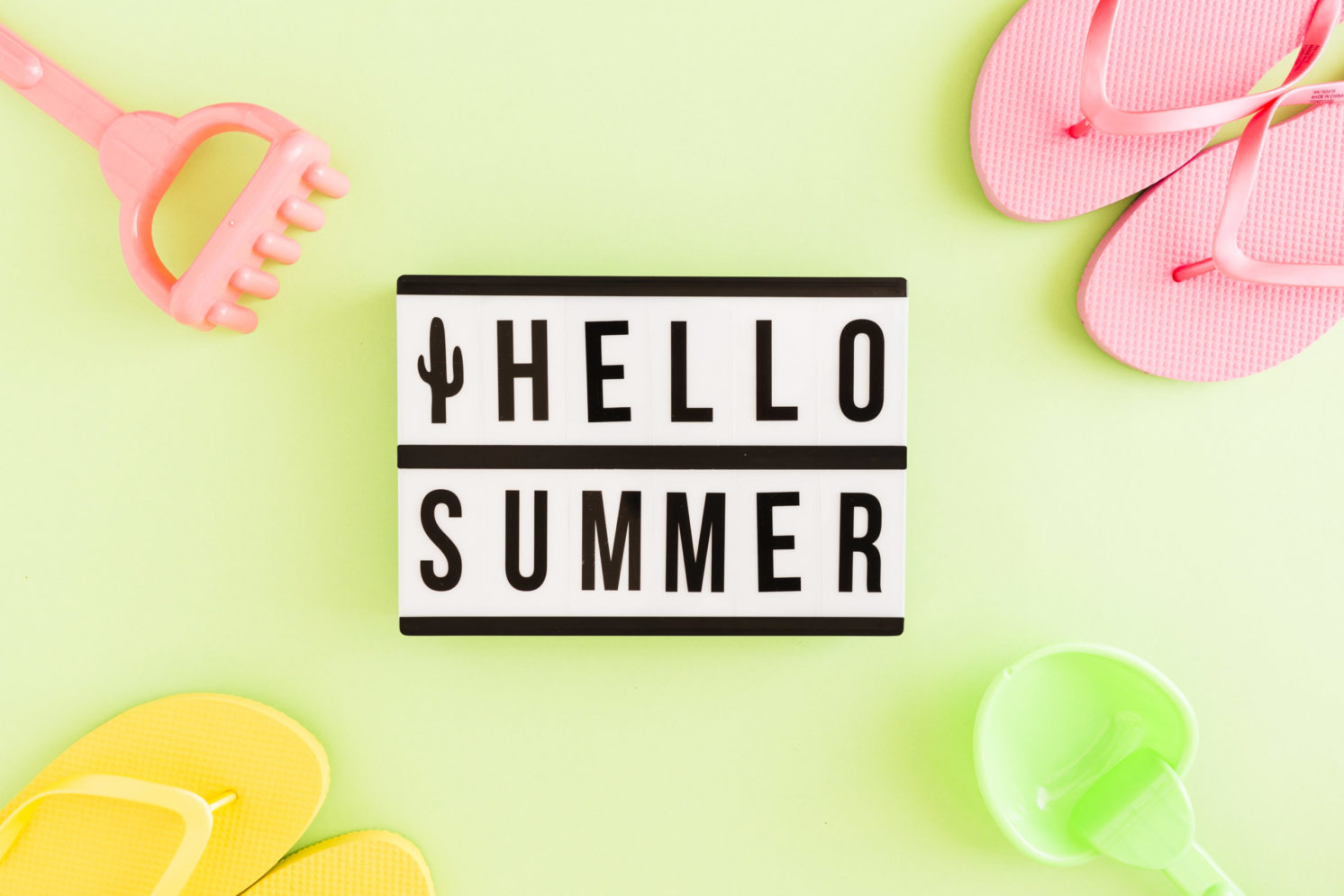 flat-lay-flip-flops-toys